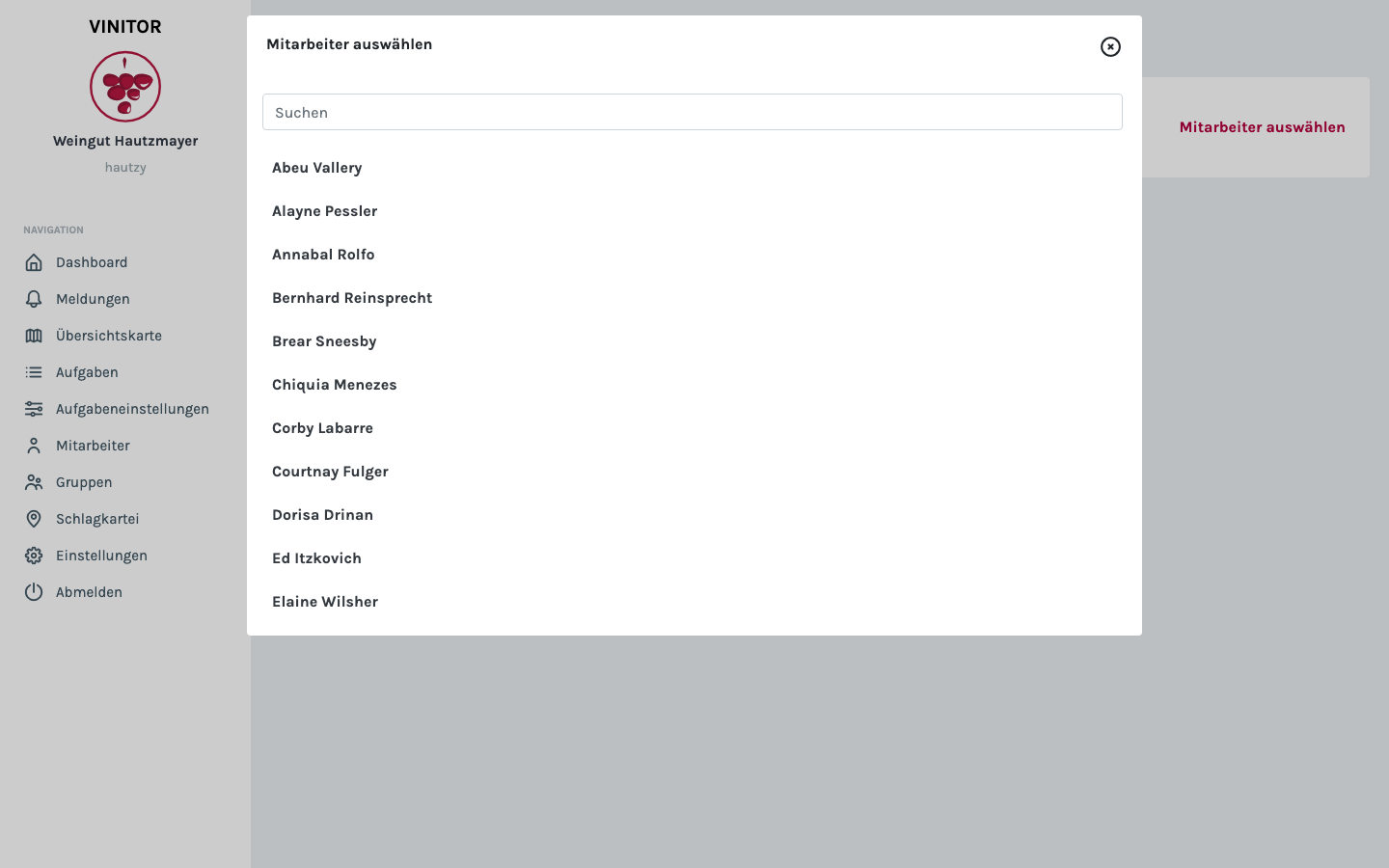 Modal Mitarbeiter auswählen mit Suchfeld und alphabetischer Liste aller Mitarbeiter.